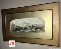 Full view of framed watercolour landscape with gold frame and arched mat opening.