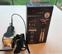 Pritech grooming set in box next to Wahl clipper