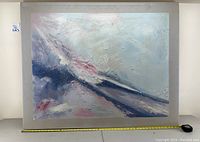 Front view of the 50 x 40 inch pastel abstract canvas art showing full composition and silver frame border, includes measuring tape for scale.