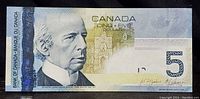 Front side of 1991 Canadian $5 bill showing portrait and security details.