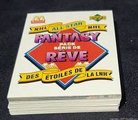 Stack of NHL hockey cards showing the front design with McDonald's and Upper Deck logos and NHL All-Star Fantasy branding in both English and French