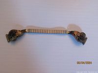 Full view of the Navajo watch band showing the flexible metal link and silver ends with stone decoration