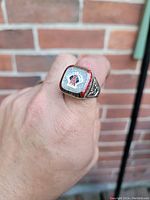 Ring showing top with Los Angeles Angels logo surrounded by small stones and 'WORLD SERIES CHAMPIONS' inscription.