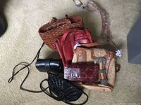 Lot overview with six purses/wallets including Patricia Nash purse