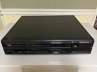 Front view of Yamaha CDV-1000 LaserDisc player turned off and closed.