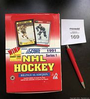 Full unopened wax box with front cover showing special Bobby Orr card promotion, Score NHL Hockey 1991 Series 1 branding, and bilingual text.
