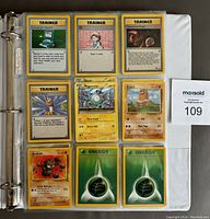 First photo showing 9 cards in a binder sleeve with Trainer cards, Magnemite, Diglett, Geodude and Grass Energy cards.