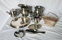 Full lot overview showing all items including pitchers, tray, basket, cups, scoop, small dishes