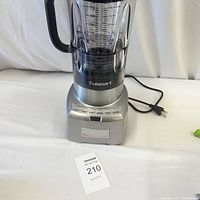 Front view of the Cuisinart blender with plastic cup attached.