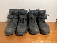 Front view of two pairs of black men's motorcycle boots from brand Altimate, size 9, showing toe, laces, and strap details.