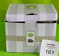 Original packaging box for the Scentsy Zen Rock wax warmer, showing branding and product name on label.