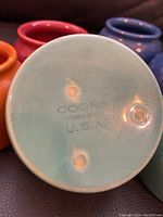 Close-up of bottom of bean pot showing Coors U.S.A. mark