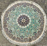 Overall top view of round rug laid flat