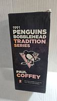 Side view of original box revealing 1991 Penguins Bobblehead Tradition Series branding and Paul Coffey identification.
