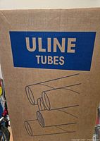 Box labeled ULINE TUBES with graphic illustration of multiple mailing tubes on the side.