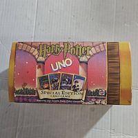 Closed original box showing Harry Potter UNO Special Edition graphics with cards on cover.