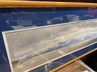 Full view of the framed watercolor showing overall size, mat and frame