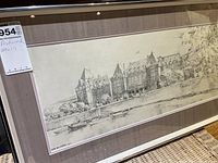 Complete view of the framed architectural sketch showing the classical building and waterfront scene in pencil, with visible framing and matting.