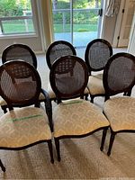Front view of six chairs arranged in two rows