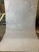 Photo of the vinyl backdrop showing snowflake design and texture