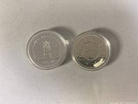 Obverse and reverse of the Throne of the Senate coin, showing detailed throne design and Queen Elizabeth II portrait.