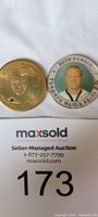 Photo showing the front of two sport coins featuring Mats Sundin of the Toronto Maple Leafs with the auction tag.