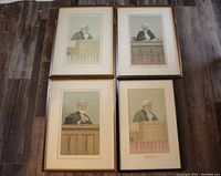 Four framed Vanity Fair judge lithographs laid out on floor showing overall condition and style.