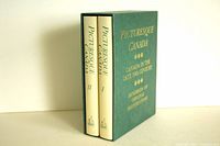 Two hardcover books in green slipcase with gold lettering on spine and cover.