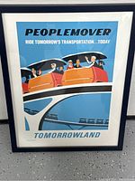 Front view of framed PeopleMover attraction art print with vibrant colors and visible text.