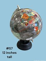 World globe showing Africa, Europe, and South Atlantic Ocean with black base stand