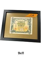 Framed item with Japanese text and intricate border design, in a black frame with brown matte, labeled 9x11 inches.