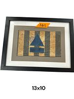 Frontal photo of the framed Jewish armband with vertical stripes and a blue triangle symbol, showing condition and size reference.