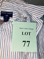 Ralph Lauren size tags on white pinstriped shirts
