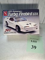 Box front of the 20th Anniversary Turbo Firebird GTA model kit by AMT showing the white race car with Indianapolis 500 and pace car decals.