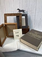 All items shown together including dictionary and four photo frames