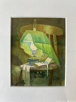Front view of watercolour painting showing a chair, lamp, book, and dog with signature and date.