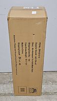 Cardboard box packaging with Amazon branding and item details printed, showing product name, weight, and supplier info.
