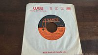 Front view of "I Do, I Do, I Do, I Do, I Do" 45rpm vinyl single with sleeve, on Atlantic Records label, WEA Music of Canada Ltd. sleeve visible.
