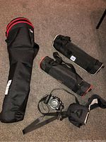 Camera and accessories on carpet including MeFOTO bag and foam wraps