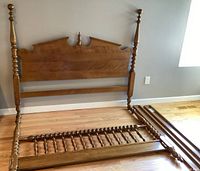 Overall layout of headboard, footboard, side rails and support rail on hardwood floor