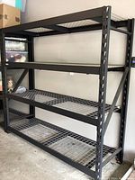 Full assembled shelving unit in a garage setting.