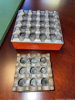 Full view of both ashtrays showing top and base.