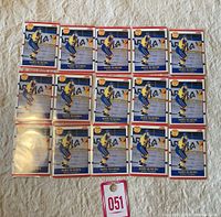 Lot of 15 Mats Sundin rookie hockey cards from the 1990/91 Score set laid out in rows on a light surface.
