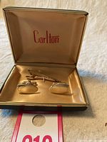 Full view of the boxed cufflinks and tie pin set with Carlton logo visible inside the lid
