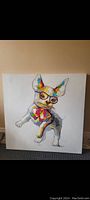 Front view of a large 33x33 inch square painting of a dog wearing glasses and colorful clothing