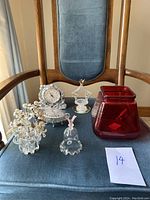 Full view of all decorative trinkets on chair seat