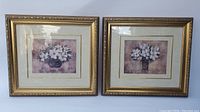 Image of both framed magnolia prints side by side showing overall condition and style.