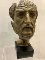 Front view of bust showing face and base