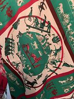Close-up of equestrian-themed print showing horses, riders, and carriages in green, red, white, and black color palette.