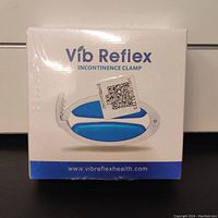 Front of sealed retail box of Vib Reflex Urinary Incontinence Clamp showing the device image and brand name.
